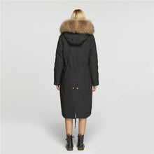 Load image into Gallery viewer, Fur Story's winter ladies leather parka coat with thick hooded long fur coat with raccoon fur