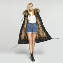 Load image into Gallery viewer, Fur Story's winter ladies leather parka coat with thick hooded long fur coat with raccoon fur